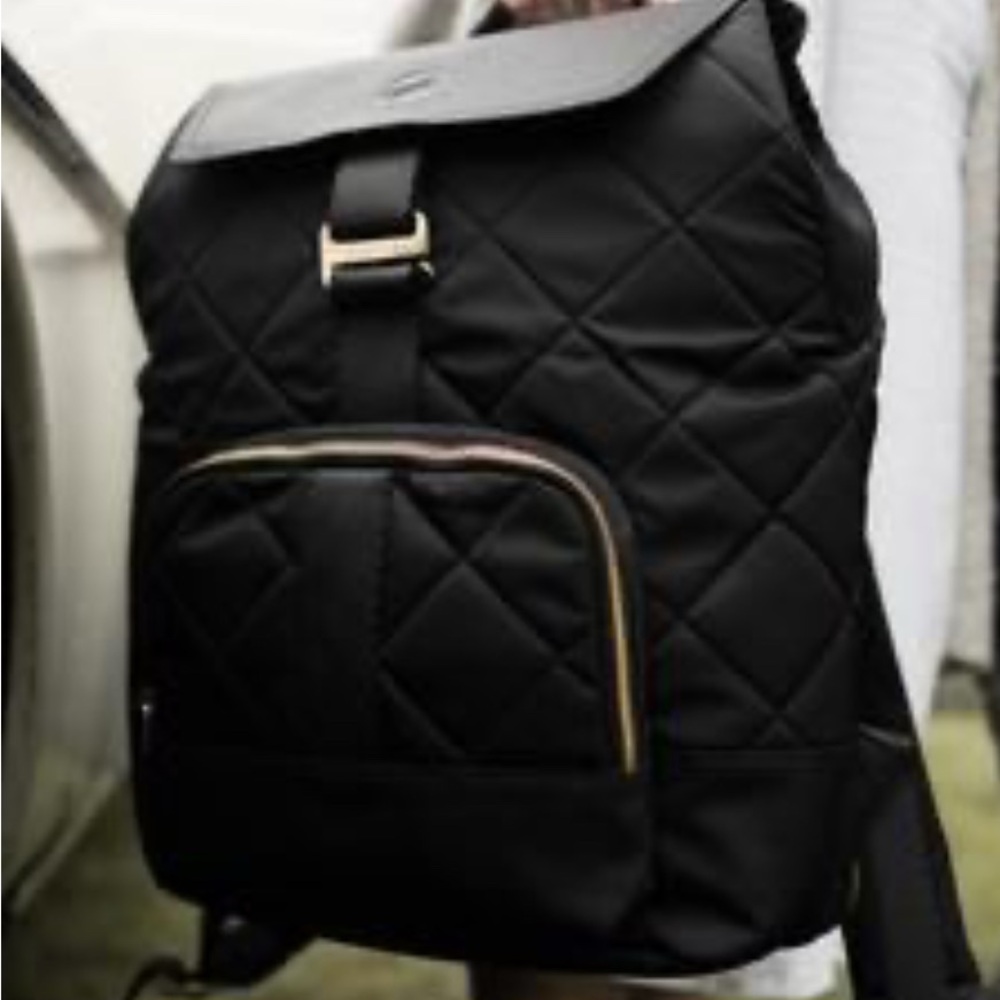 The Jojo Diaper Bag Backpack
- Paperclip